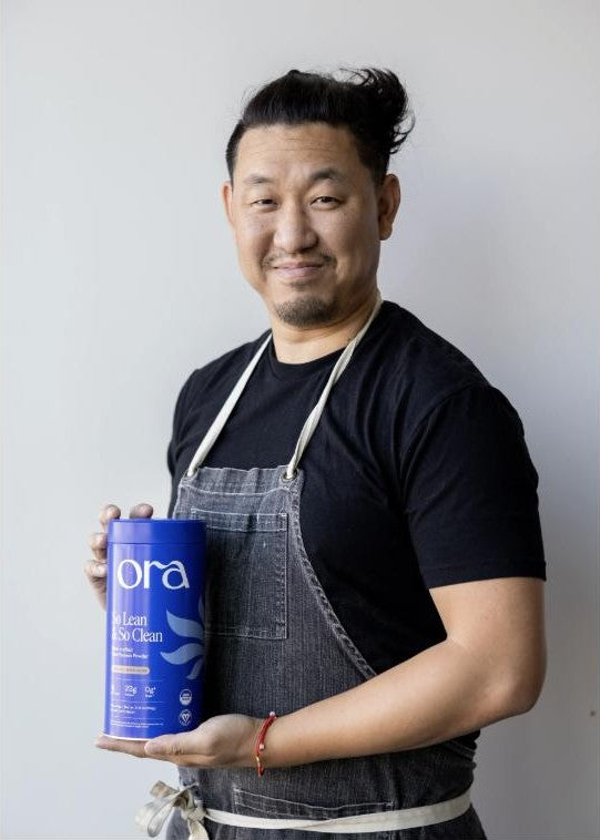 Chef Ron holding a tin of So Lean & So Clean